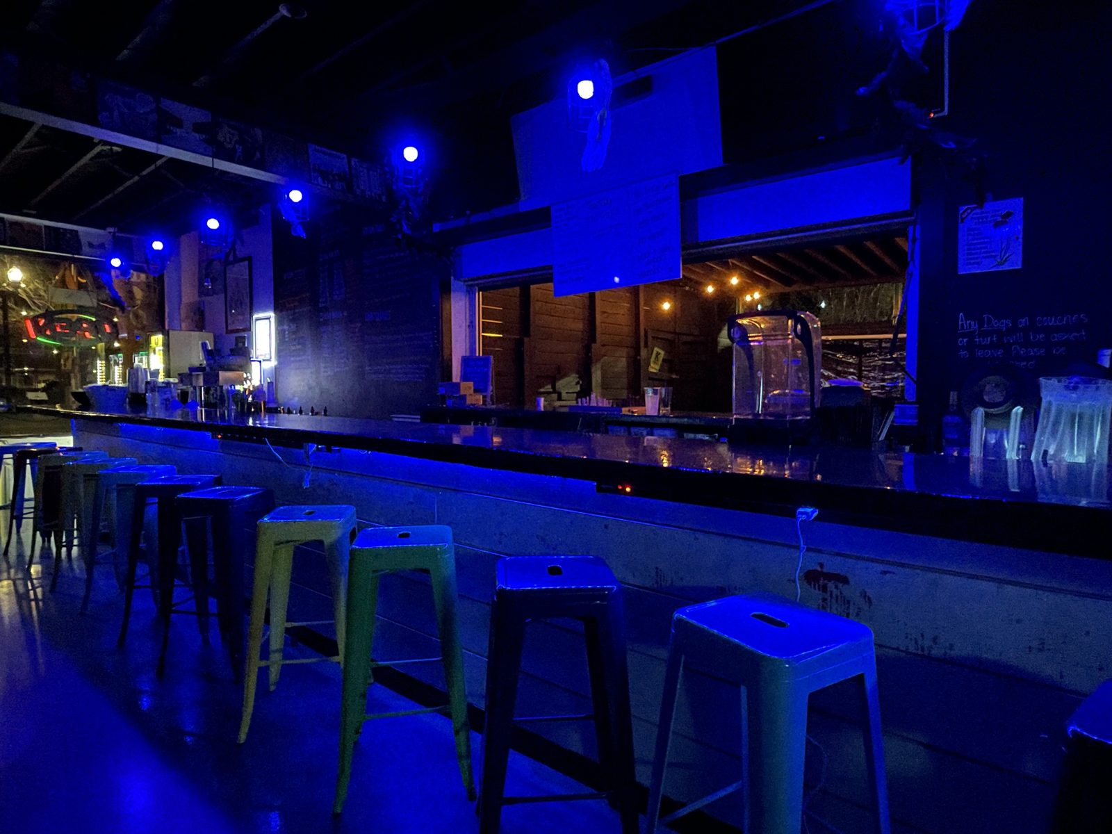 Neon-lit bar interior at Kava & Company San Marco